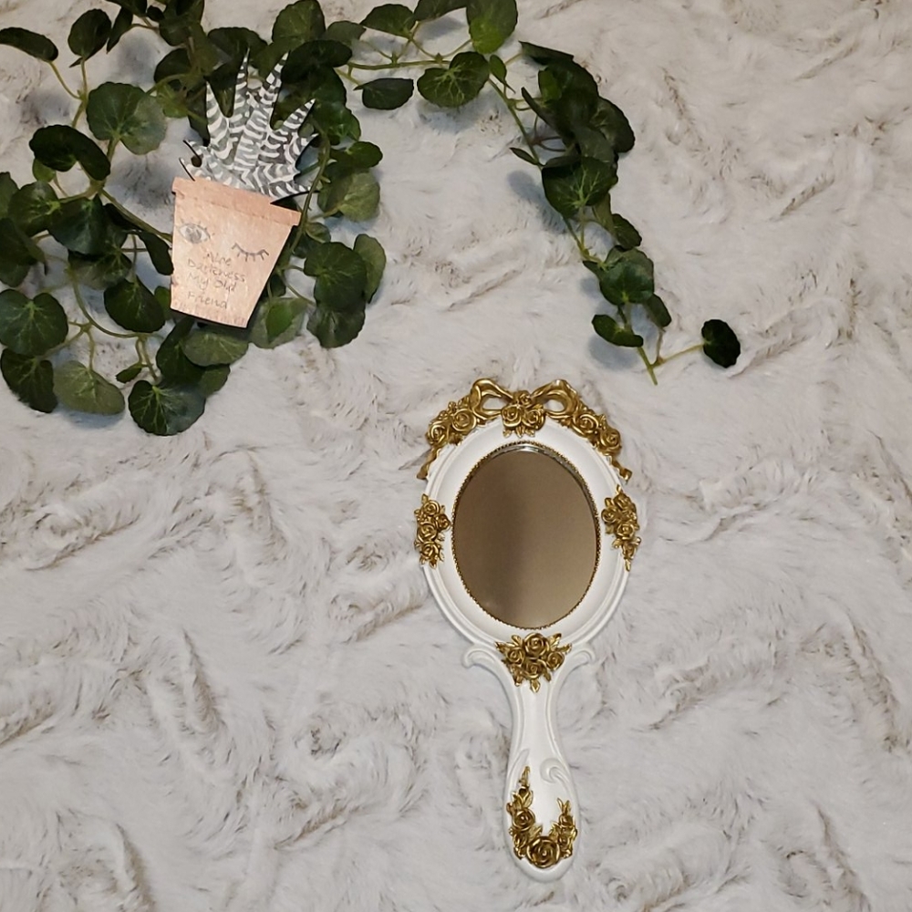 Painted resin hand mirror